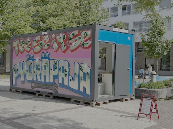 Länsi-Vantaan Pyöräpajan julkisivu Kuva Länsi-Vantaan Pyöräpajan julkisivusta.